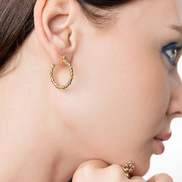 Ball huggie earrings sales